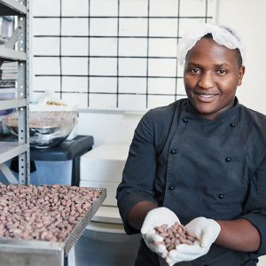 student learning how to process food