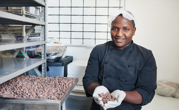 student learning how to process food